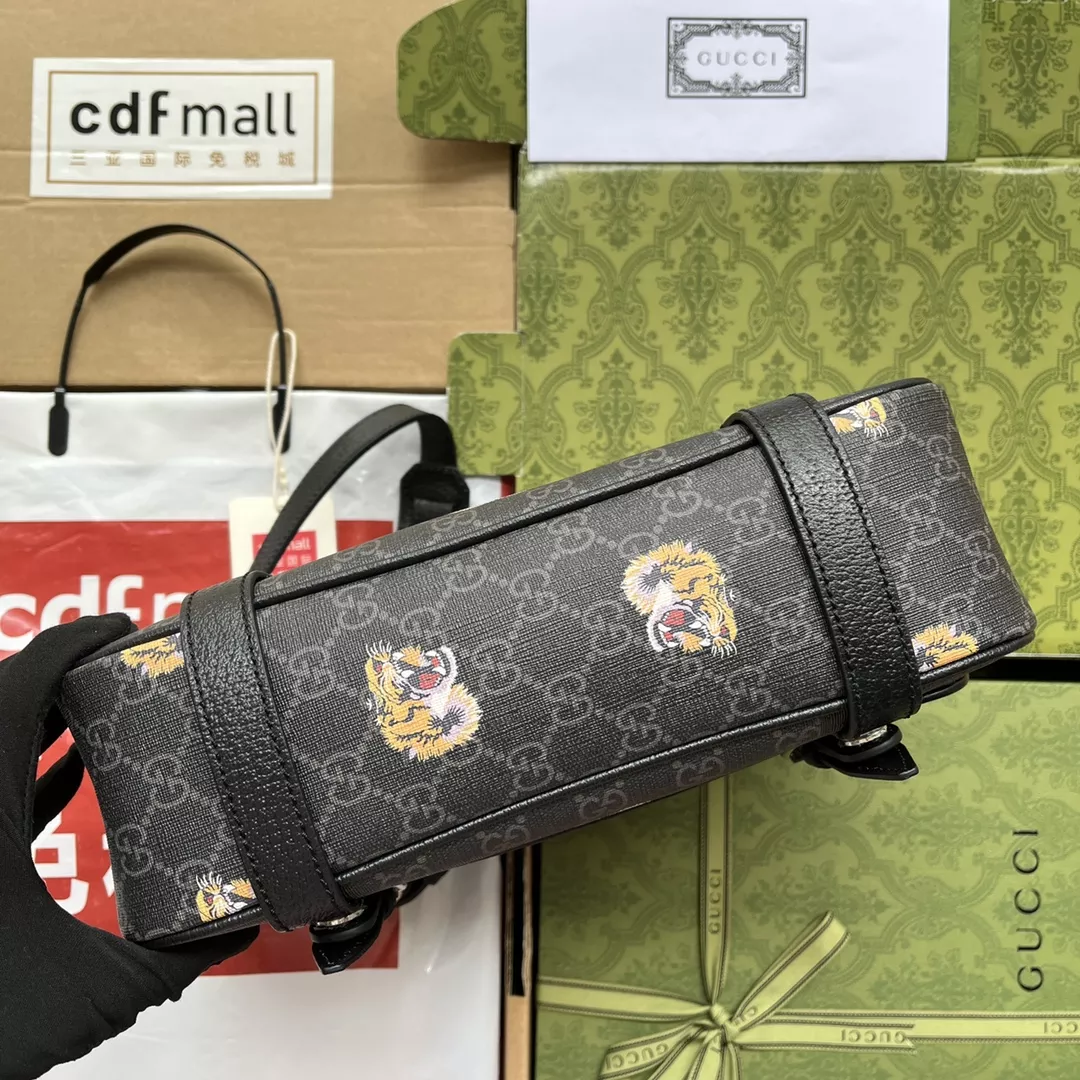 G*u*i tiger print messenger bag