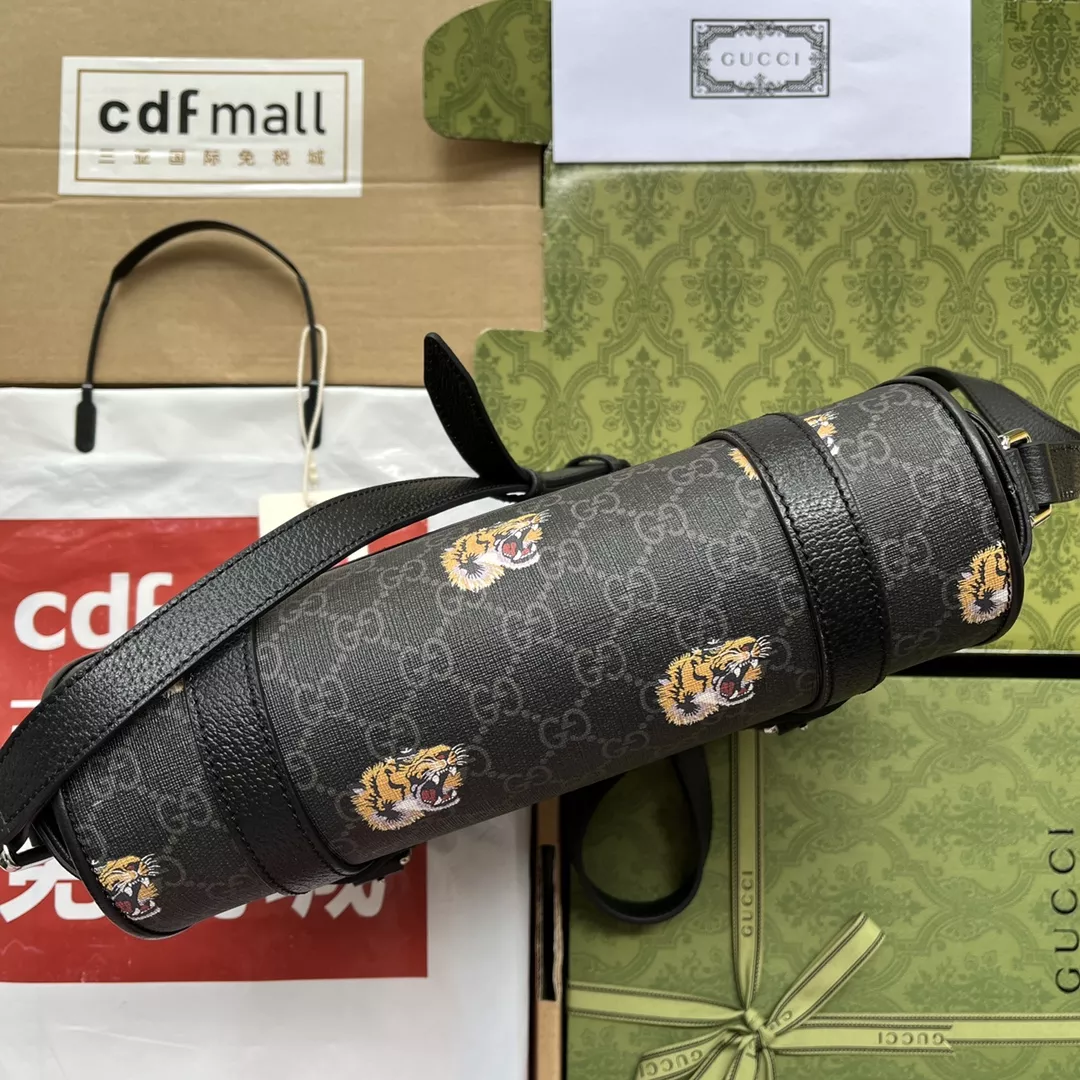 G*u*i tiger print messenger bag