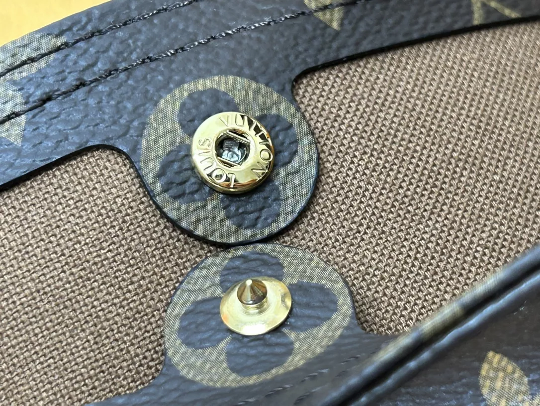 Louis Vuitton Atlantis GM in Coated Canvas with Gold-tone