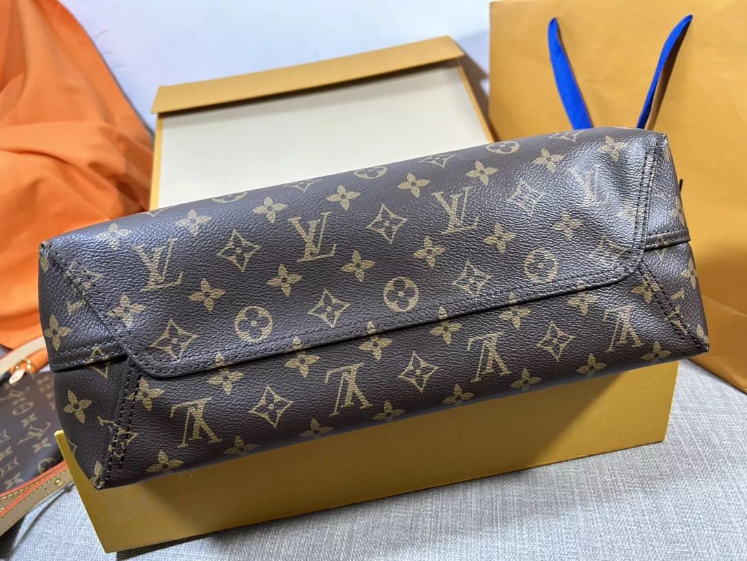 Louis Vuitton Atlantis GM in Coated Canvas with Gold-tone