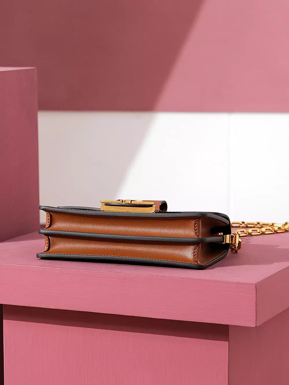 Dauphine East West Monogram Reverse Brown