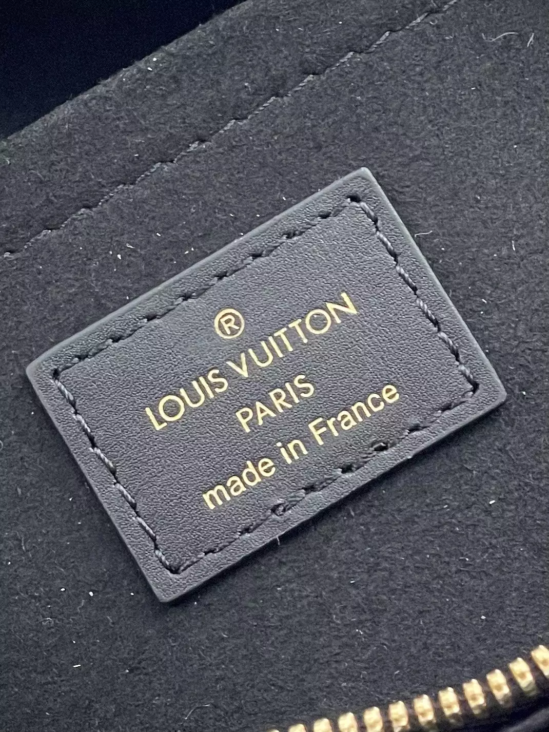 OnTheGo East West Monogram Empreinte Black Leather