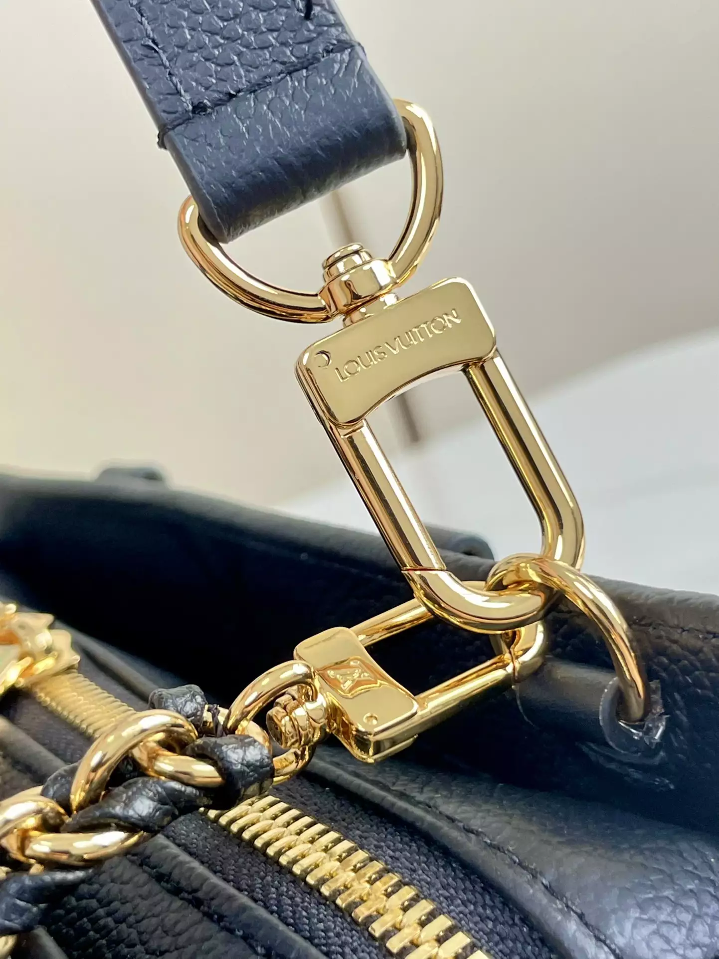 OnTheGo East West Monogram Empreinte Black Leather