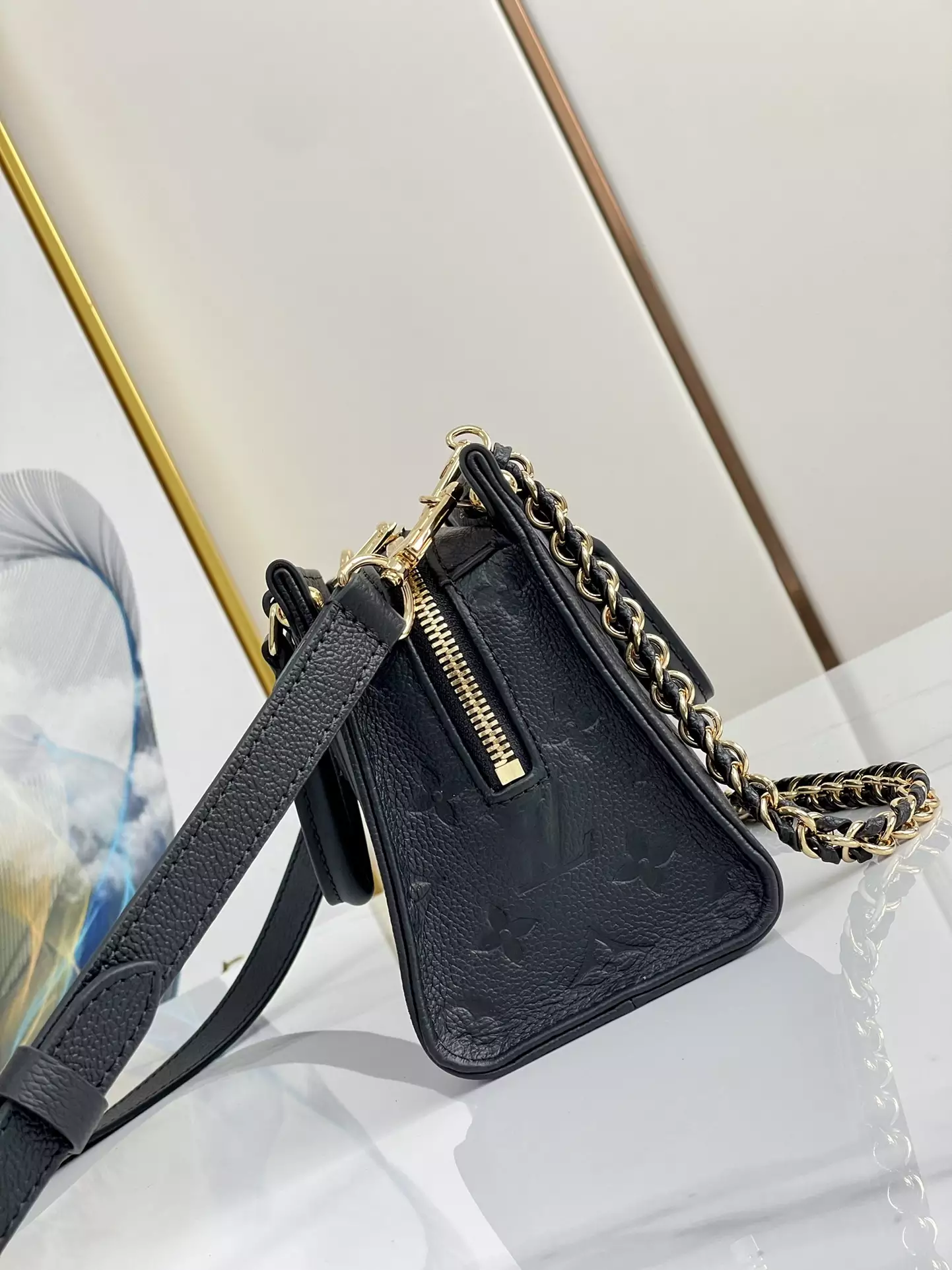 OnTheGo East West Monogram Empreinte Black Leather