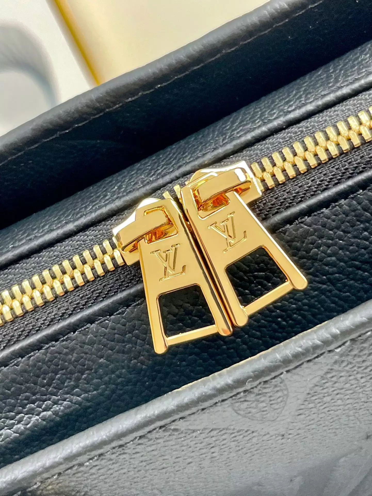 OnTheGo East West Monogram Empreinte Black Leather