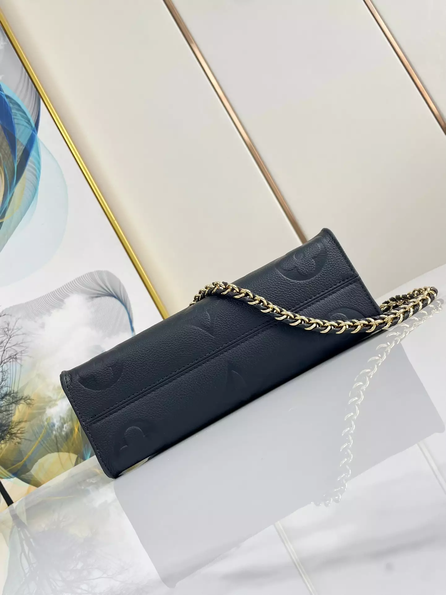 OnTheGo East West Monogram Empreinte Black Leather