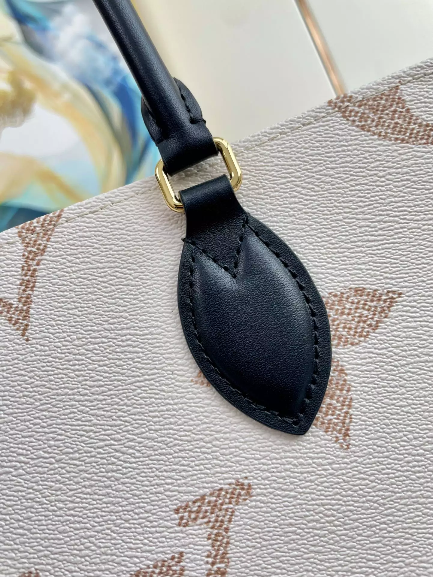 OnTheGo MM Monogram Dune Coated Canvas