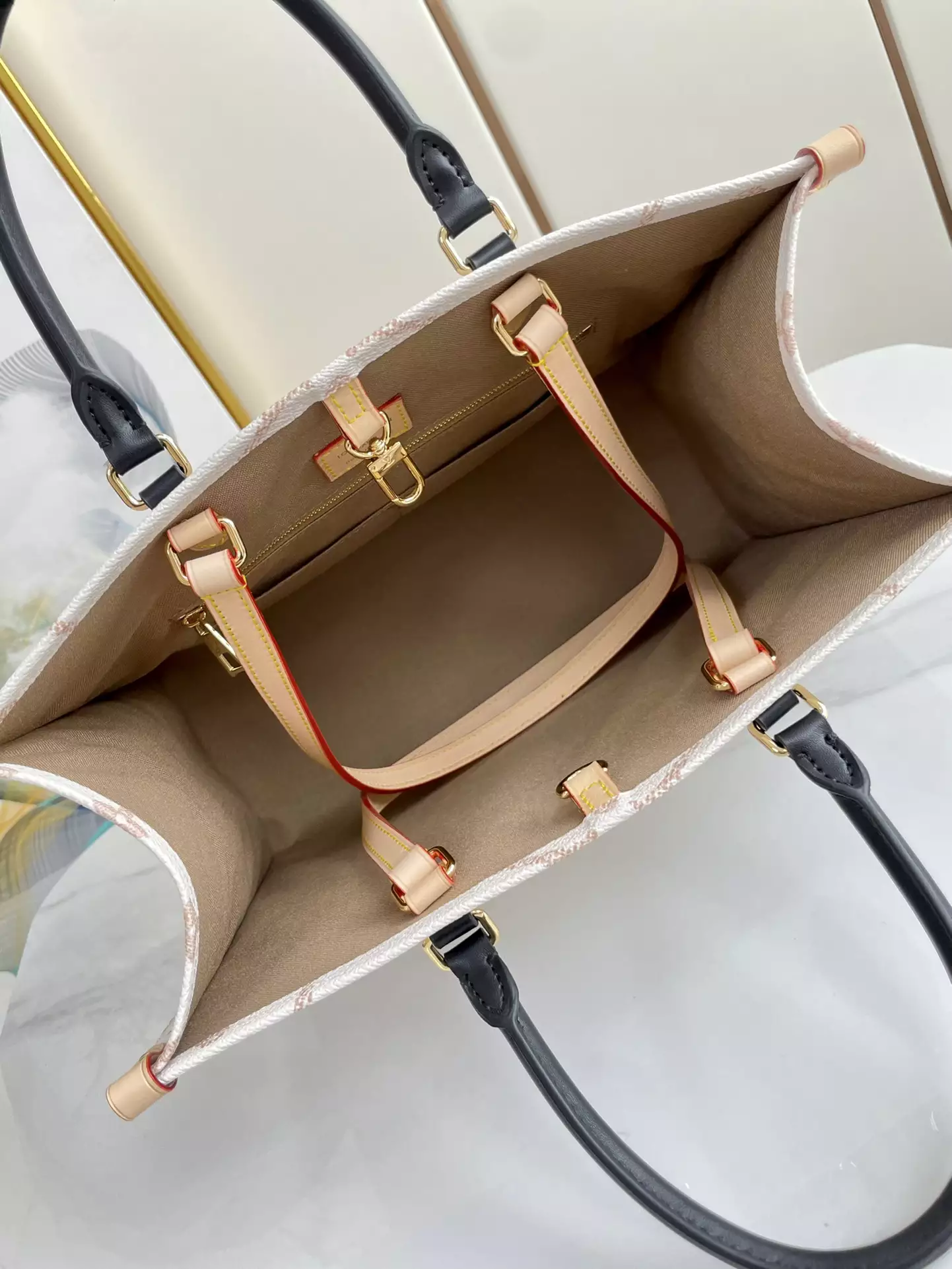 OnTheGo MM Monogram Dune Coated Canvas