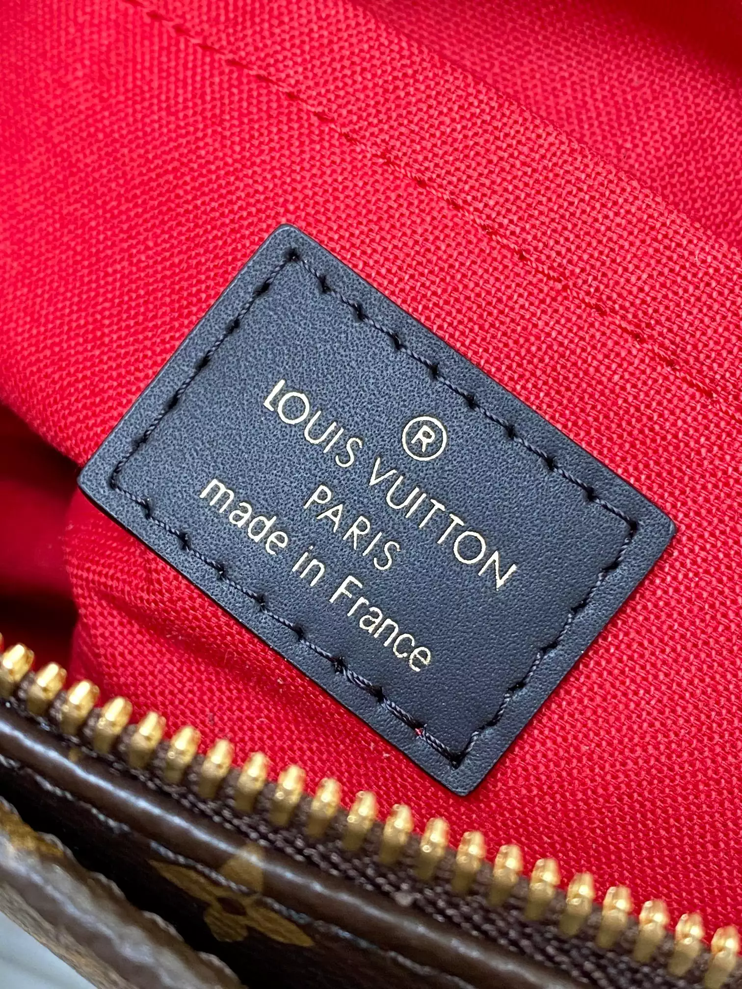 Onthego East West Monogram Reverse Brown Latte