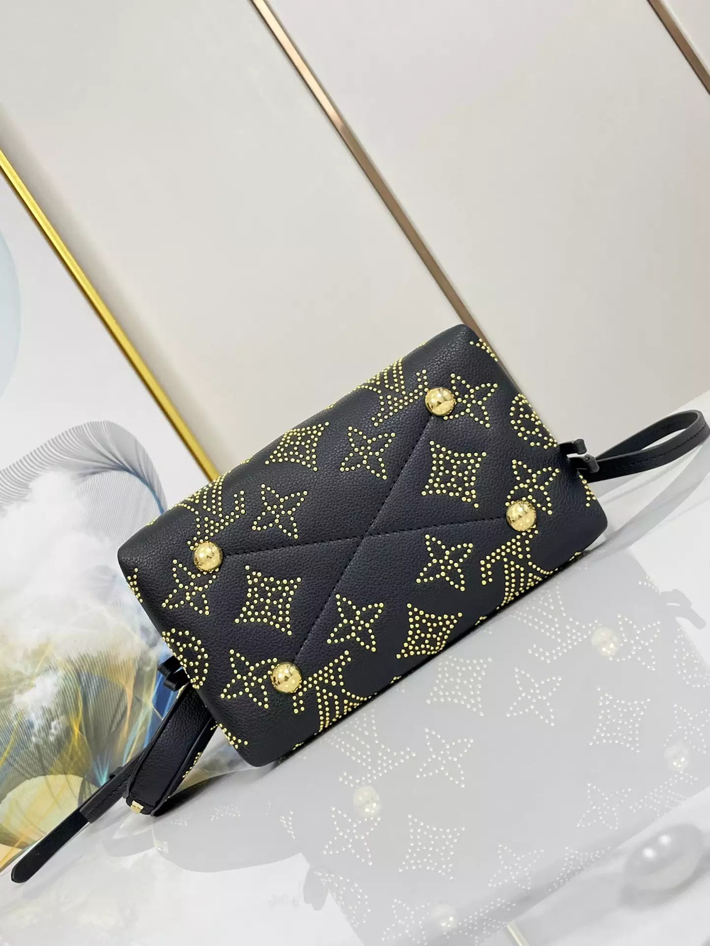 Bella Bucket Bag Monogram Gold Lamination Black Leather
