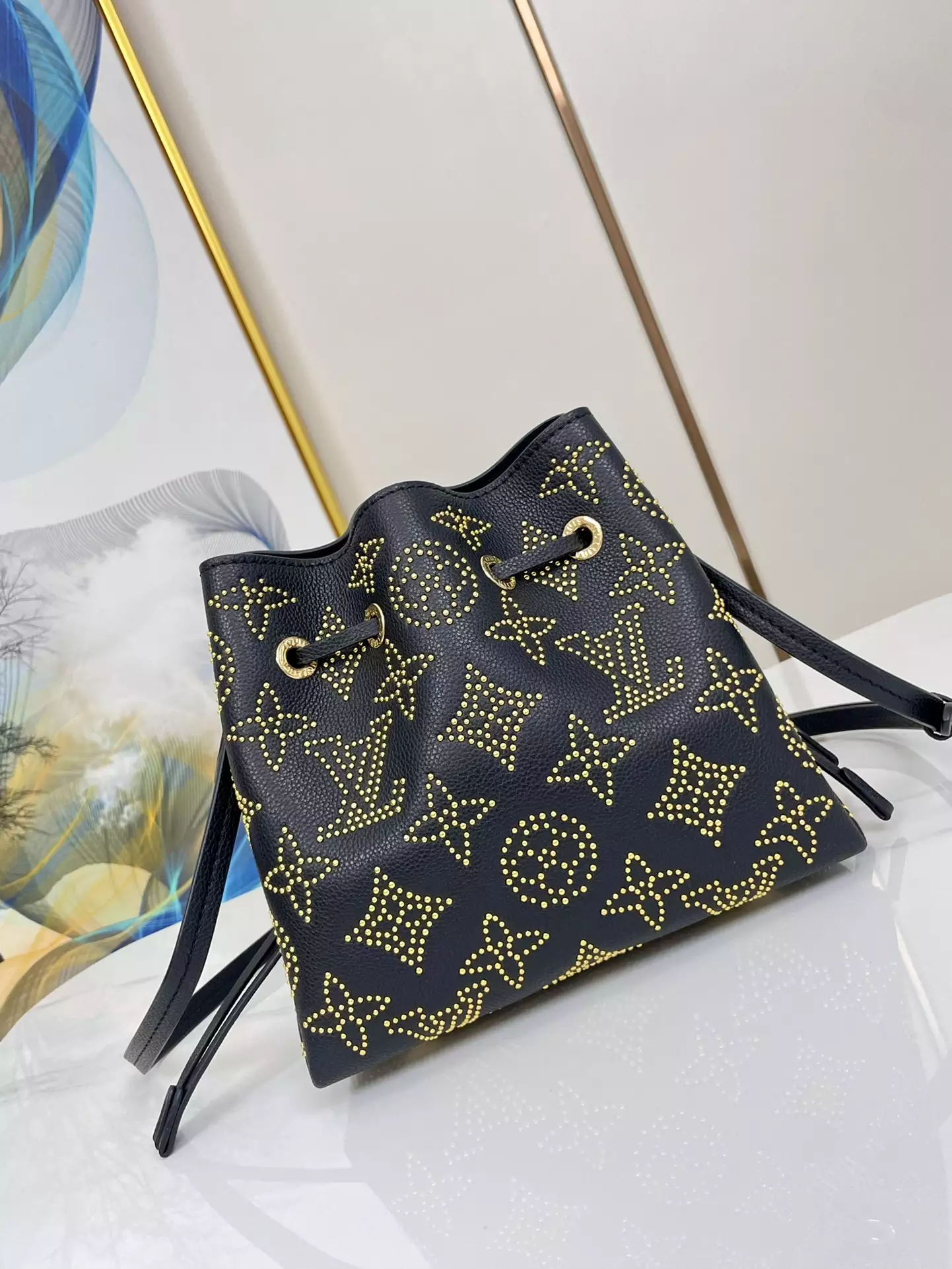Bella Bucket Bag Monogram Gold Lamination Black Leather