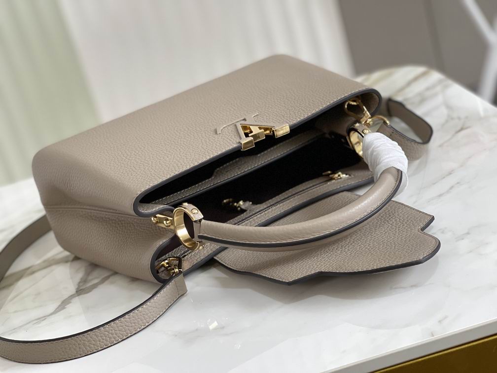 Capucines MM Taurillon Leather Bag