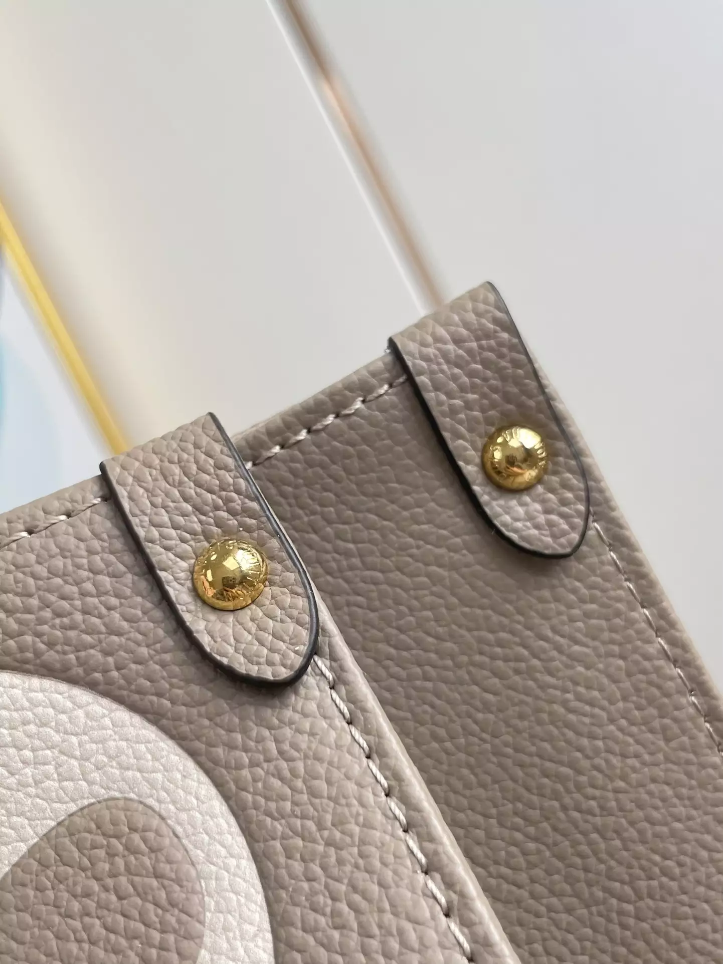 OnTheGo MM Bicolor Monogram Empreinte Dove Grey/Cream Leather