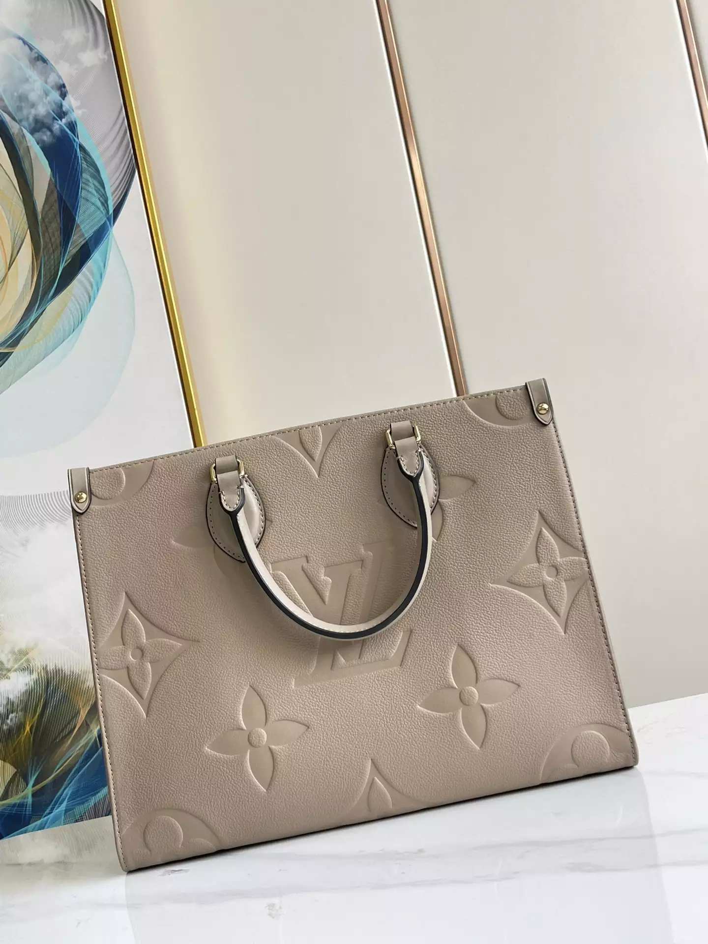 OnTheGo MM Monogram Empreinte Dune Leather