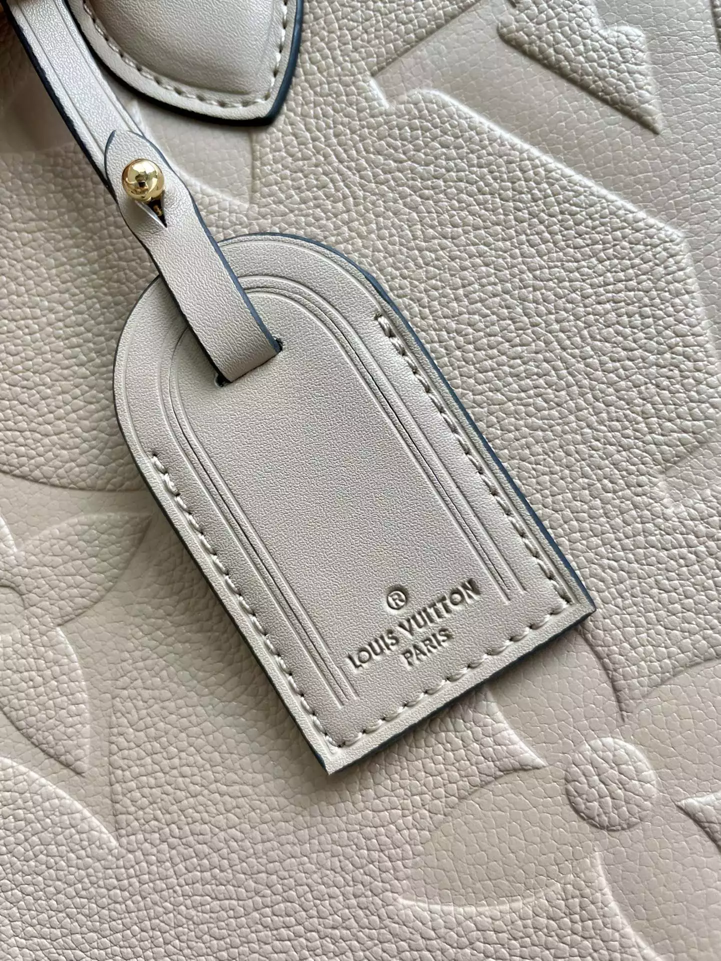 OnTheGo MM Monogram Empreinte Dune Leather