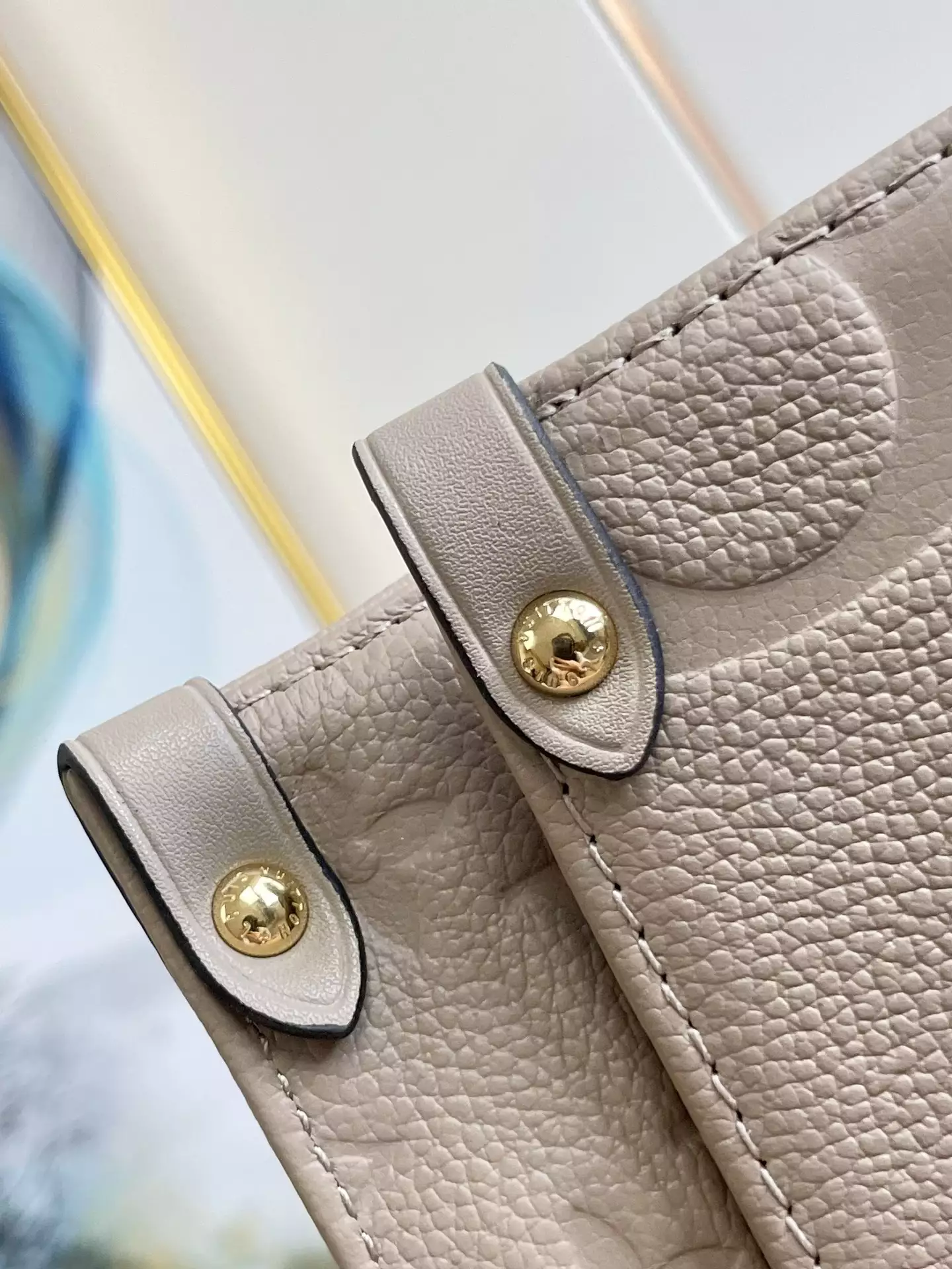 OnTheGo MM Monogram Empreinte Dune Leather