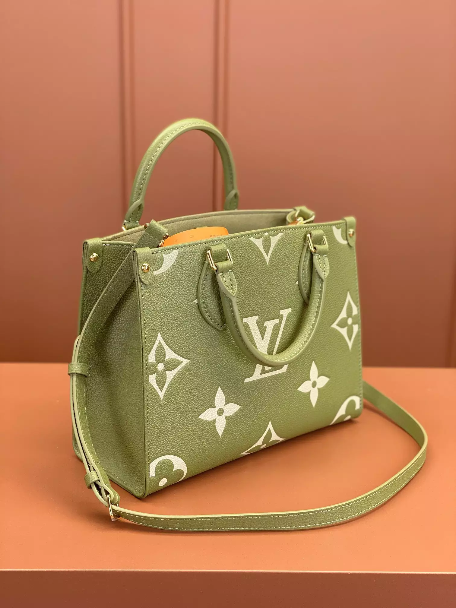 OnTheGo PM Bicolor Monogram Empreinte Light Khaki/Cream Leather