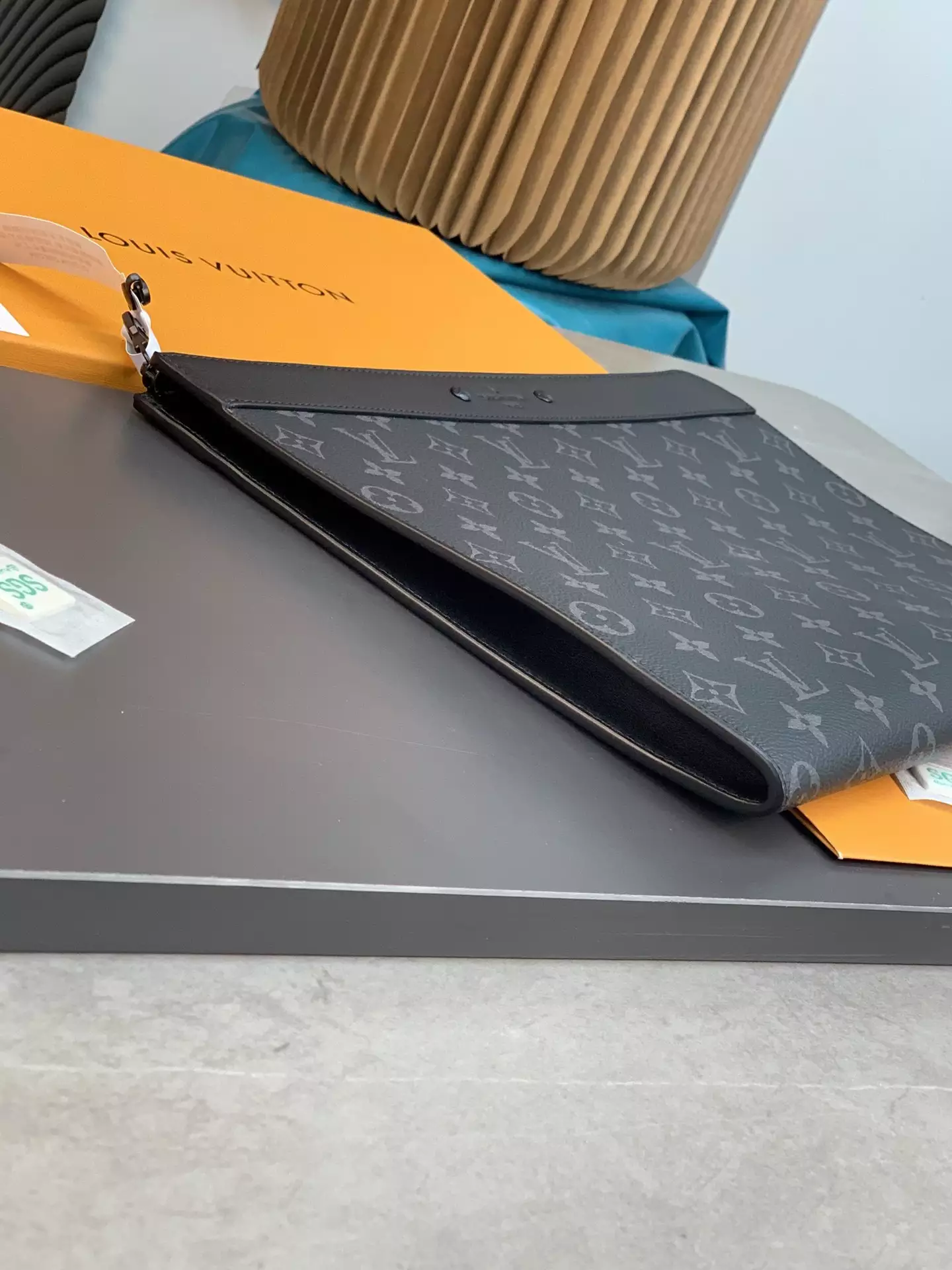 Pochette Jour Monogram Eclipse Coated Canvas