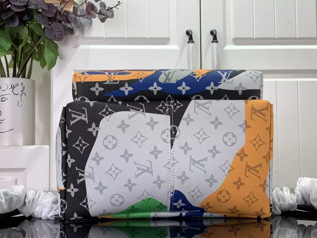 Discovery Backpack PM Multicolor Monogram Canvas And Cowhide Leather