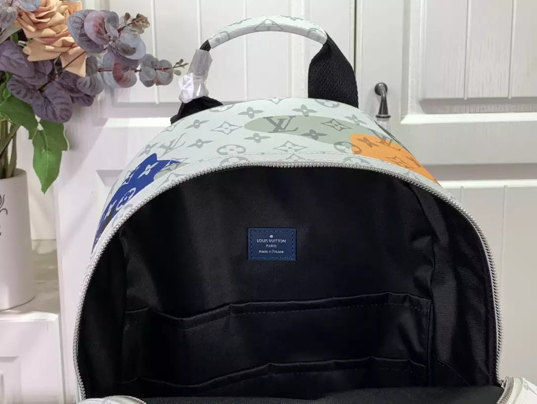 Discovery Backpack PM Multicolor Monogram Canvas And Cowhide Leather