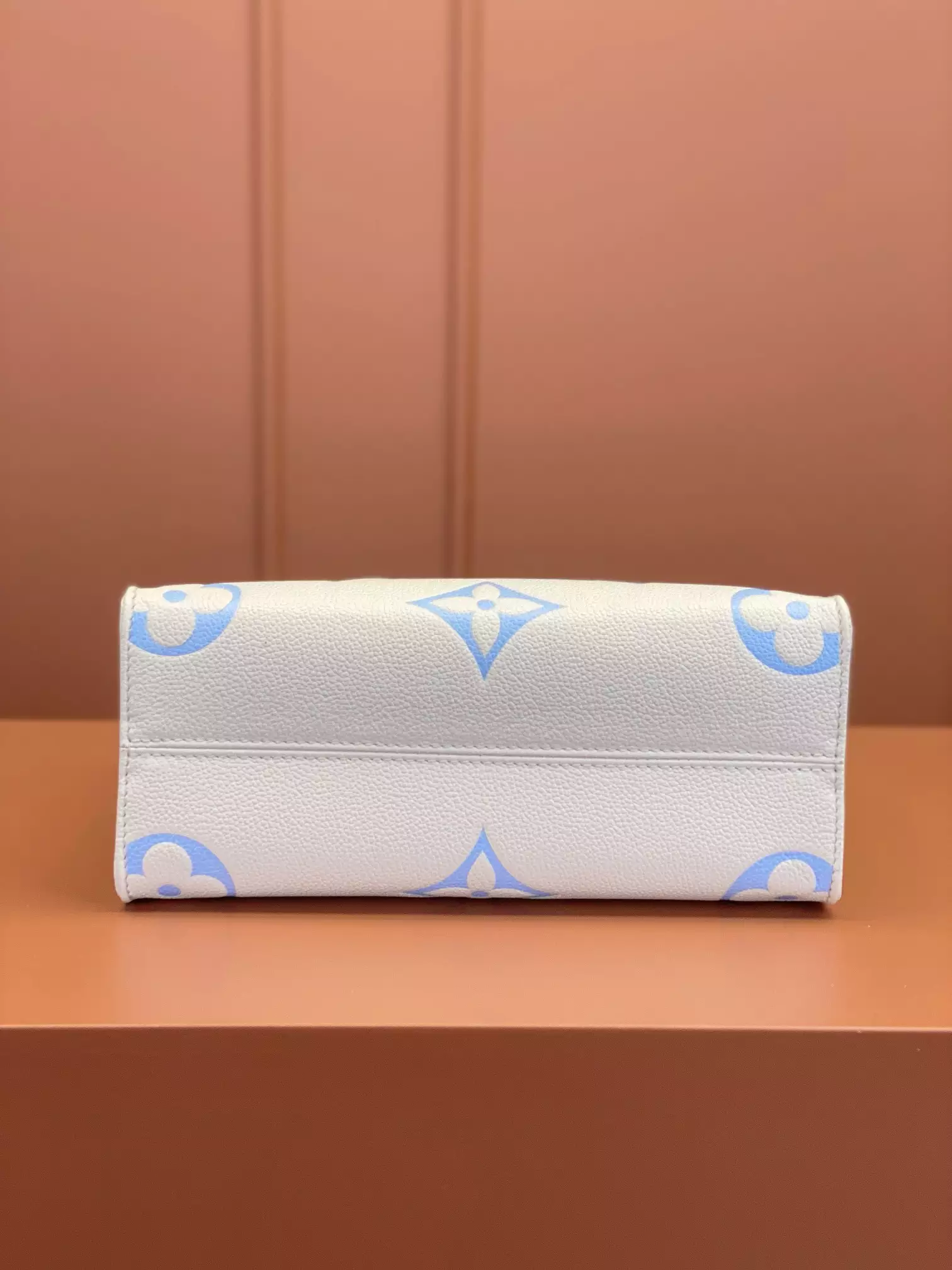 OnTheGo PM Bicolor Monogram Empreinte Latte/Candy Blue Leather
