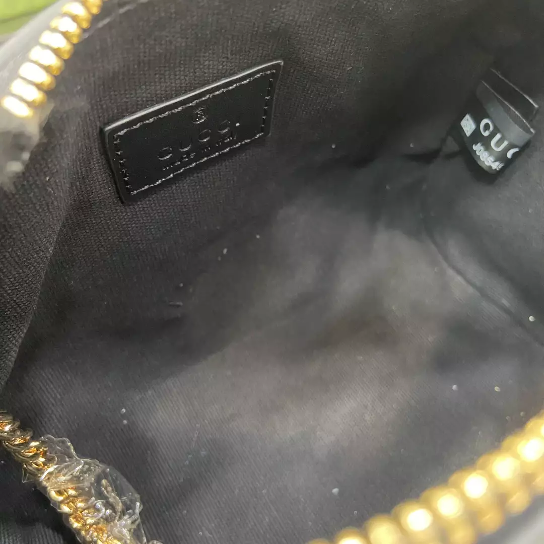 GG Super Mini Top Handle Bag in Black GG Leather