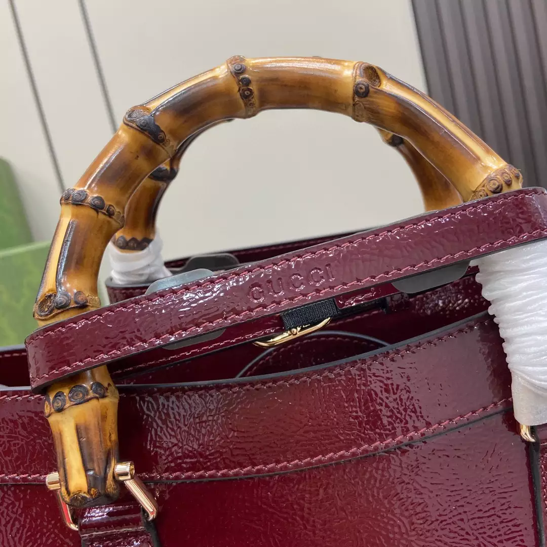 G*u*i diana medium tote bag in dark red patent leather