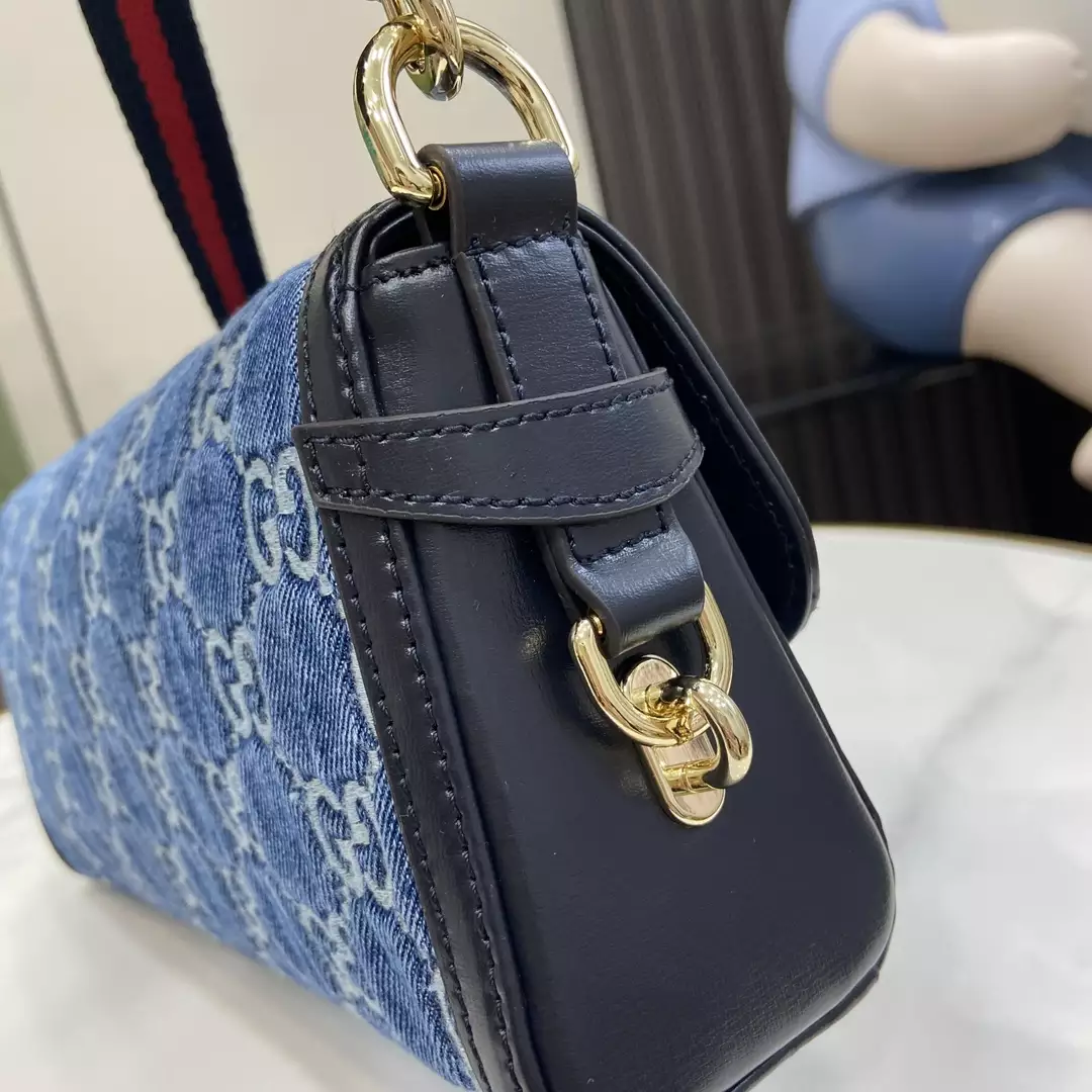 G*u*i luce small shoulder bag in blue gg denim
