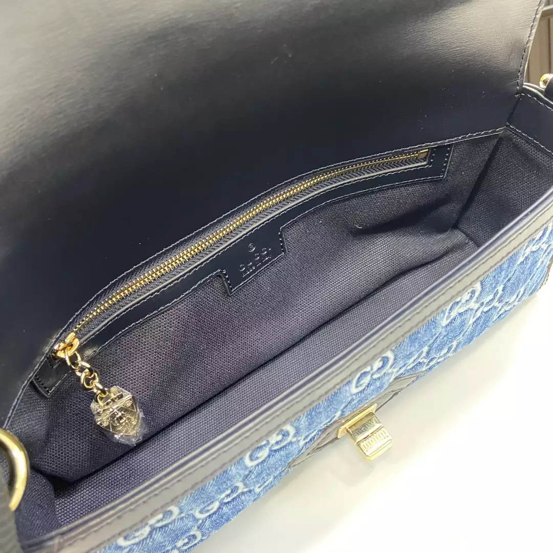 G*u*i luce small shoulder bag in blue gg denim