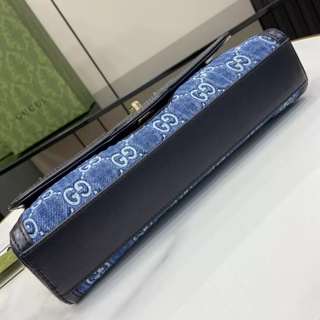 G*u*i luce small shoulder bag in blue gg denim