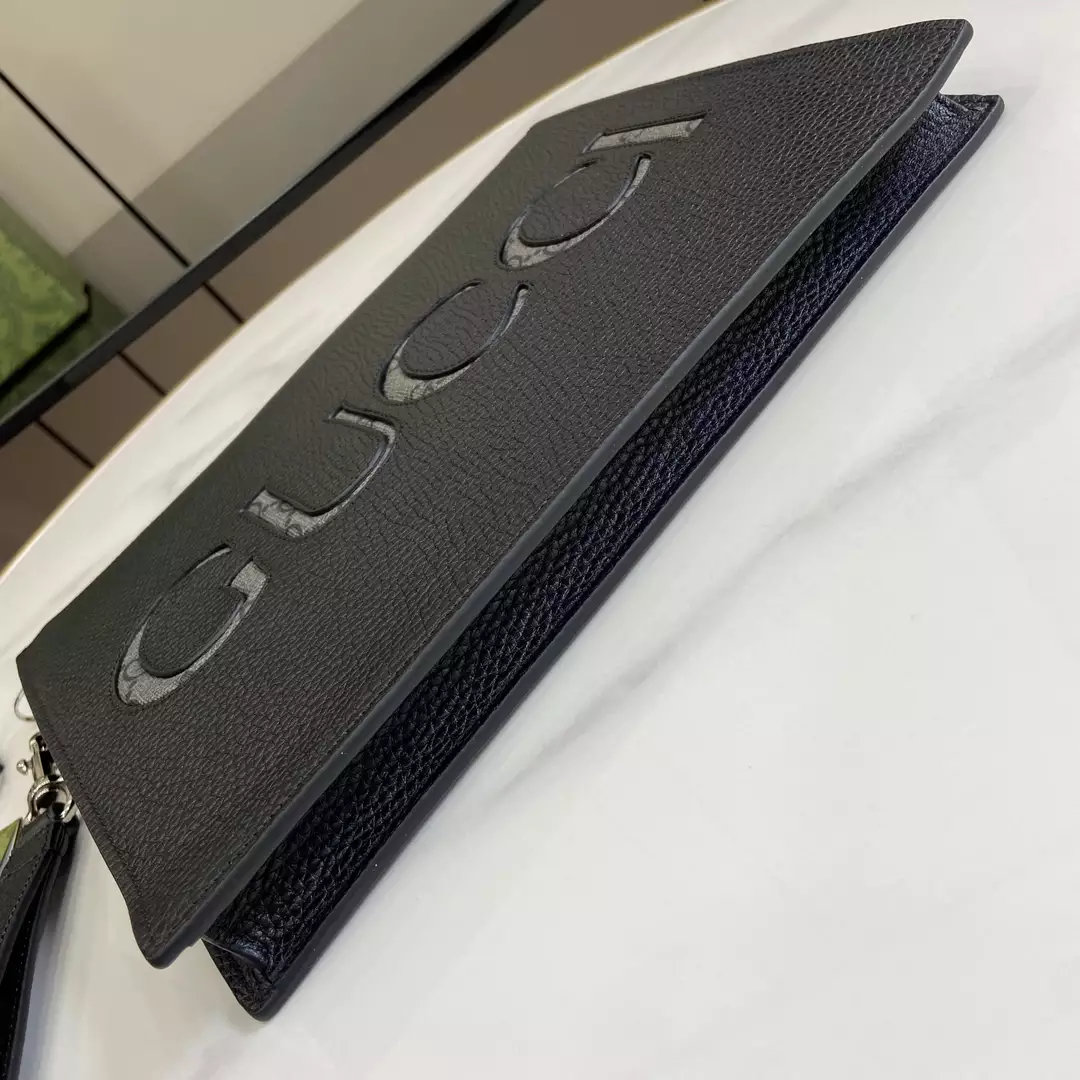 G*u*i pouch with strap in black leather