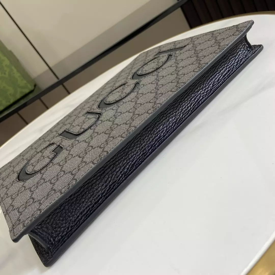 G*u*i pouch with strap in grey and black gg supreme